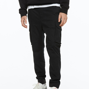 กางเกงวอร์มผู้ชายสีดำผ้าฝ้ายแบบผูกเชือกรัดเอวสวมใส่สบาย - Product Image 2