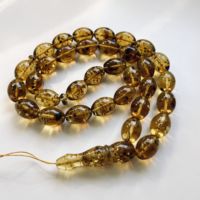 Collier artisanal écoresponsable en ambre de la Baltique avec 33 perles d'ambre vertes et insectes, Tasbih musulman, bijoux Amberstone