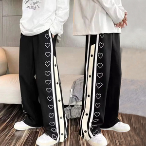 กางเกงวอร์มทรงหลวมสำหรับผู้ชายสีดำและสีขาว - Product Image 5