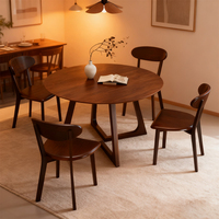 Table à manger ronde en bois moderne et combinaison de chaises 4 places écologiques pour le salon à la maison