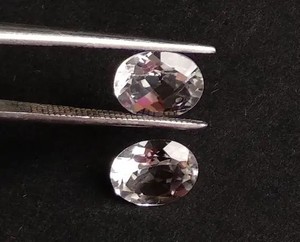 10mm 12mm Topacio blanco natural Corte ovalado Calibrado Piedra preciosa suelta Calibrado Piedras sueltas a granel Fabricante Precio de fábrica en línea - Product Image 1