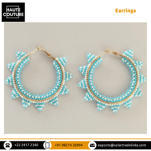 Vente en gros de boucles d'oreilles rondes en turquoise blanche de haute qualité pour femmes, à prix compétitif sur le marché - Product Image 3