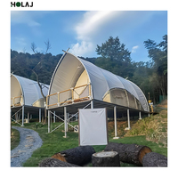 Cabane de glamping en toile courbée, lodge préfabriqué, tente d'hébergement en bord de mer pour les stations balnéaires et le développement de campings côtiers