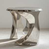 Table console artistique moderne en aluminium socle sculptural torsadé finition argent poli meubles de salon de luxe décor