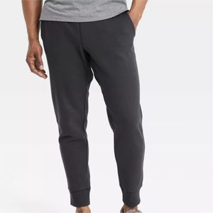 OEM Hombres Slim Fit Jogger Pantalones de chándal de secado rápido Entrenamiento Gymwear con patrón sólido para uso en el gimnasio - Product Image 1