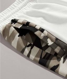 กางเกงขาสั้นออกกำลังกายสำหรับผู้ชายกางเกงขาสั้นสำหรับวิ่งมาราธอนแบบลำลองมีกระเป๋าสีทึบระบายอากาศได้ดีน้ำหนักเบา4ทางโลโก้ได้ตามต้องการ - Product Image 2