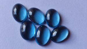 Cabochons ovales en topaze bleue de Londres naturelle de haute qualité 3x5mm à 10x12mm bijoux en pierres précieuses à dos plat - Product Image 5