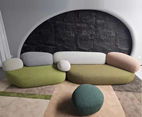 Canapé modulable en tissu en forme de L, style galets, pour salon minimaliste ou salle d'attente