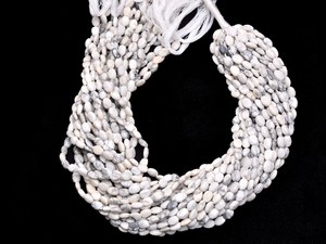 AAA Howlite Gemstone 7x5mm Cuentas facetadas ovaladas | Hilo de 13 pulgadas | Cuentas ovaladas de piedras preciosas semipreciosas de howlita natural para la fabricación de joyas - Product Image 2