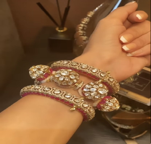 Vibrant pink and <b>white</b> kundan brass kadas for a <b>festive</b> statement look. Trendy available at wholesale prices. - Product Image 1