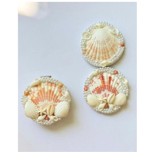 Ocean style hand mirror with shell <b>frame</b> suitable for beauty routines vacation gift kits and coastal makeup organization - Product Image 3