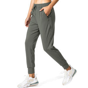 Joggers transpirables para mujer con bolsillos Logotipo personalizado Venta al por mayor Pantalones de salón de invierno para entrenamiento de yoga Correr-Pantalones de chándal - Product Image 1
