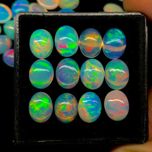 12 pièces boîte éthiopien opale Cabochon bonne qualité Multi Flashy opale Cabochon Lot forme ovale Welo opale pour la fabrication de bijoux - Product Image 1