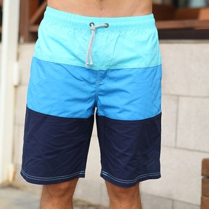 กางเกงเล่นกระดานโต้คลื่นสำหรับผู้ชายกางเกงขาสั้นอเนกประสงค์ระบายอากาศได้ดีแห้งเร็วดูดซับเหงื่อสำหรับเล่นเซิร์ฟชายหาดและเล่นกีฬา - Product Image 3