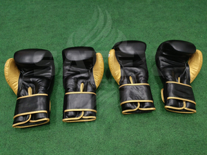 ถุงมือชกมวยหนังแท้พร้อมที่จับเพื่อประสิทธิภาพการต่อสู้และการปกป้องมือ ออกแบบมาสำหรับผู้ชาย ผู้หญิง และเยาวชนใช้ในการฝึกซ้อม - Product Image 3