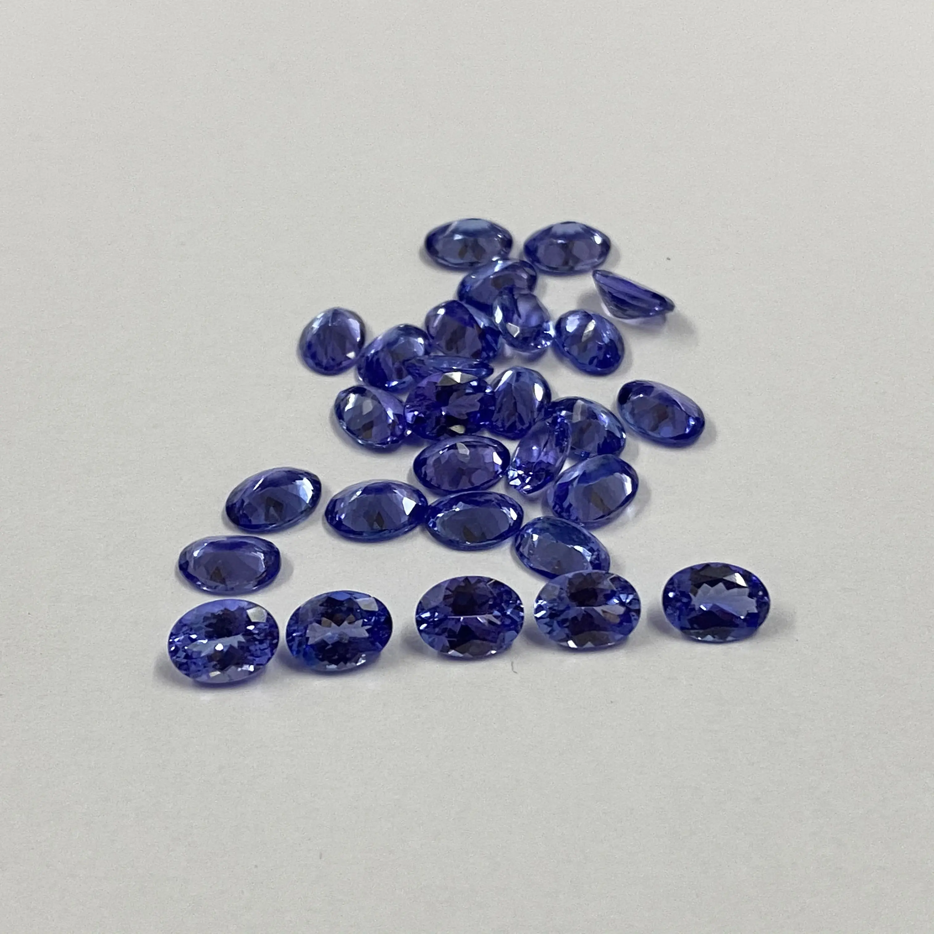 Topbest kualitas longgar potongan Oval 100% Natural 3x4mm sampai 8x10mm Tanzanite warna biru AAA ++ kelas longgar grosir batu permata pemasok