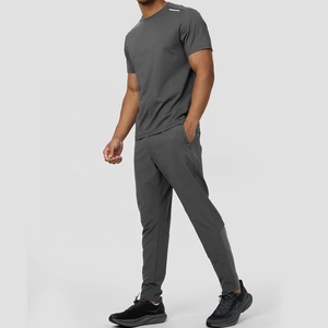 ชุดวอร์ม2ชิ้นสำหรับผู้ชายมีซิปรูดกางเกงกันลมยืดหยุ่น - Product Image 1