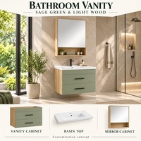 Meubles sur mesure pour toute la maison : canapé-lit vert sauge, table à manger ronde, armoires de cuisine, armoire, meuble-lavabo de salle de bain