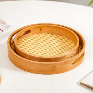 Bandeja de bambú de ratán hecha a mano exquisitamente hecha a mano con asas Bandeja de bambú redonda para servir elegante y exhibición decorativa - Product Image 5