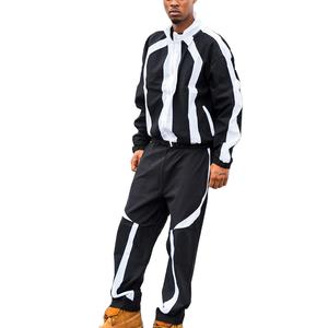 ชุดเซ็ทลำลองน้ำหนักเบา ผ้าไนลอน 100% แห้งเร็ว แบบ 2 ชิ้น เสื้อฮู้ดมีเชือกผูก กางเกงจ็อกเกอร์ กันลม - Product Image 1