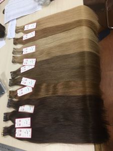 Venta al por mayor cinta brasileña Remy doblemente dibujada en extensiones de cabello humano calidad europea sin enredos sin desprendimiento - Product Image 3