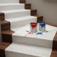 Rouleau de protection auto-adhésif en feutre blanc pour les éclaboussures de peinture et l'entretien des sols pendant les travaux de rénovation
