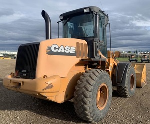 Cargador de ruedas Case 521E 2011: Cargador de tamaño medio fiable para construcción y manipulación de materiales - Product Image 1