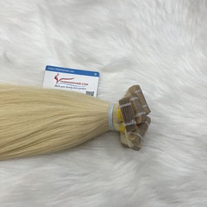 Extensiones de cabello humano vietnamita Rubio de alta calidad al por mayor Tape-In estilo dibujado doble onda natural - Product Image 3