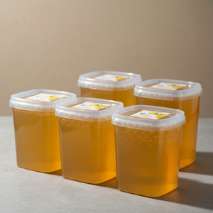 Miel de fleurs d'agrumes biologique emballé avec 30% de nectar naturel Miel de fleurs d'agrumes disponible pour les gros acheteurs du monde entier - Product Image 1