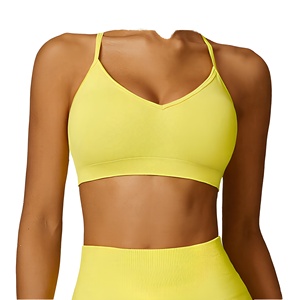 Soutien-gorge de sport pour femme jaune à col en V, maintien moyen, couleur unie, extensible, idéal pour le yoga et l'entraînement - Product Image 1
