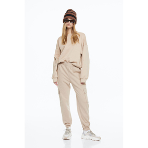Joggers de mujer con logotipo personalizado, ajustados y ligeros de alta calidad con decoración de encaje para el verano - Product Image 1