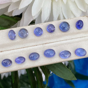 หินแทนซาไนต์ธรรมชาติที่น่าตื่นตาตื่นใจอัญมณีทรงหลังเบี้ยทรงหลวมสี19.05กะรัต - Product Image 1