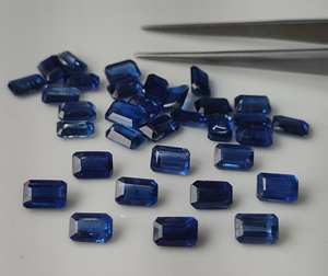 พลอยไคยาไนต์ธรรมชาติทรงแปดเหลี่ยมเจียระไนแบบเหลี่ยมเพชรพลอย ขนาด 3x5 มม.-8x10 มม. สีฟ้ามีประกายสี สำหรับทำเครื่องประดับ ขายส่ง - Product Image 1