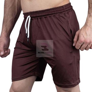 Pantalones cortos atléticos para hombre con cintura elástica Pantalones cortos de estilo casual de patrón sólido transpirable con bolsillos - Product Image 5