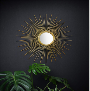 Classic sunburst <b>mirror</b> with long, straight golden rays, a stunning decorative <b>accent</b>, available at wholesale prices. - Product Image 1