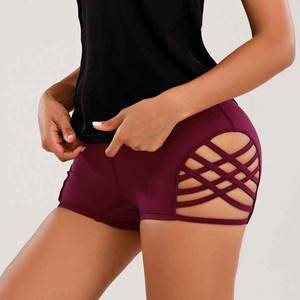 Pantalones cortos de Yoga de cintura alta para mujer, pantalones cortos deportivos sexis con diseño hueco y correa cruzada transpirable para mujer - Product Image 3