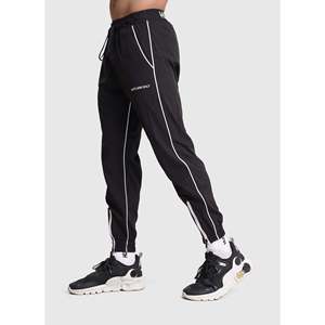 Pantalon de jogging évasé noir pour homme, taille haute, respirant, écoresponsable, avec bande latérale et cordon de serrage aux chevilles, coupe ample - Product Image 4
