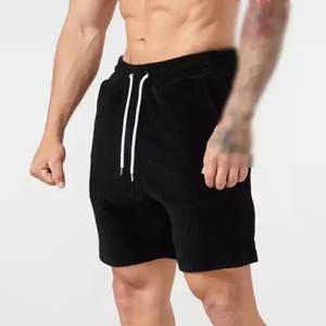 Short de jogging d'été de couleur unie pour hommes avec cordon de serrage élastique à la taille et poche pantalon short en toile uni à jambe large - Product Image 4