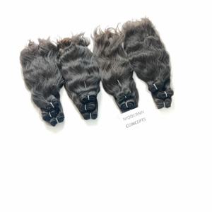 Vente en gros de paquets ondulés noirs naturels non transformés vierges indiennes extensions de cheveux humains de temple bon marché et élégant - Product Image 1