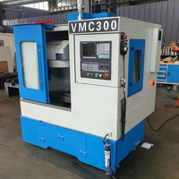 Centre d'usinage vertical CNC VMC300 3 axes, 4 axes pour le traitement des métaux