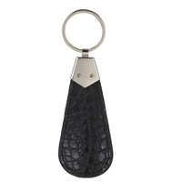 Vente en gros Porte-clés en cuir Logo personnalisé Porte-clés chausse-pied en cuir PU
