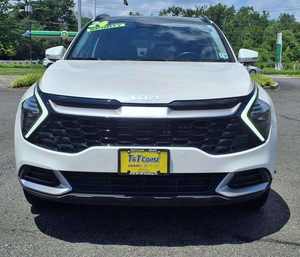 Sharp 2024 K i a Sport age Hybrid EX AWD con asientos de cuero Paquete Premium Sistema de navegación Bluetooth Techo solar - Product Image 1