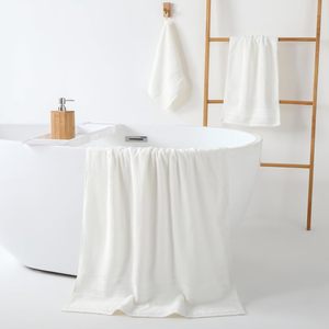 Vente chaude OEM Serviettes de bain et de main en coton personnalisées Couleur unie Tissé Technics Prix d'usine bon marché pour usage personnel - Product Image 2