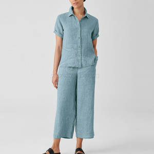 ชุดเซ็ต 2 ชิ้น เสื้อผ้าฝ้ายน้ำหนักเบา สไตล์ลำลอง เป็นมิตรกับสิ่งแวดล้อม สำหรับผู้หญิง ลายเรียบ ตกแต่งกระดุม เสื้อแขนสั้น กางเกงขายาวทรงกว้าง เหมาะสำหรับฤดูร้อน - Product Image 1