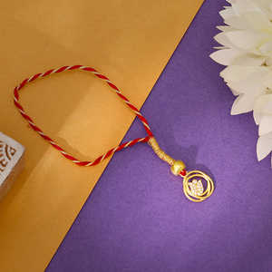 Pendentifs et breloques en diamant doré pur Affection Lumba Rakhi élégant - Product Image 1