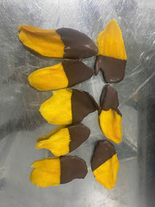 Experience exotic flavors of pineapple dried fruit covered in black chocolate and mango <b>wrapped</b> in creamy white. - Product Image 3