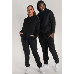 Ensemble sweat-shirt et pantalon de survêtement unisexe noir à manches longues, couleur unie, vêtements décontractés, coton tricoté, coupe ample, toutes saisons, style streetwear - Product Image 1
