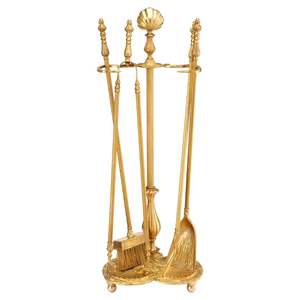 Handcrafted antique brass fire <b>tools</b> with functional components and sturdy base made for elegant homes and <b>fireplace</b> management - Product Image 1