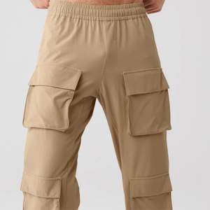 Pantalon tactique Ripstop pour l'extérieur et l'utilisation d'un matériau à séchage rapide avec poches cargo disponible en camouflage et couleur unie - Product Image 5