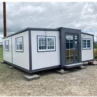 Maison modulaire préfabriquée de luxe, cabine portable contemporaine conçue pour les séjours en boutique et l'hôtellerie de plein air haut de gamme